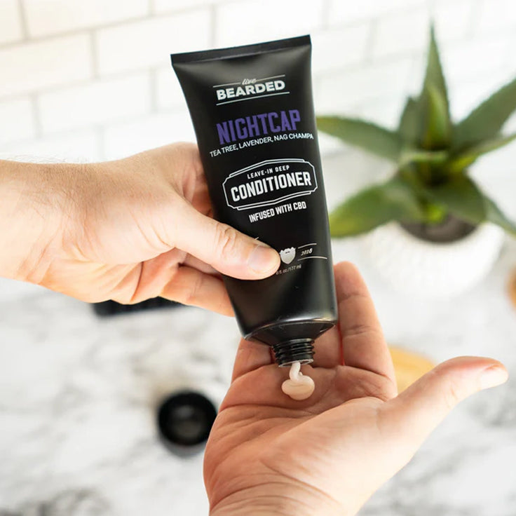 Customer using Live Bearded beard conditioner