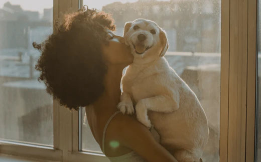 Woman holding a dog